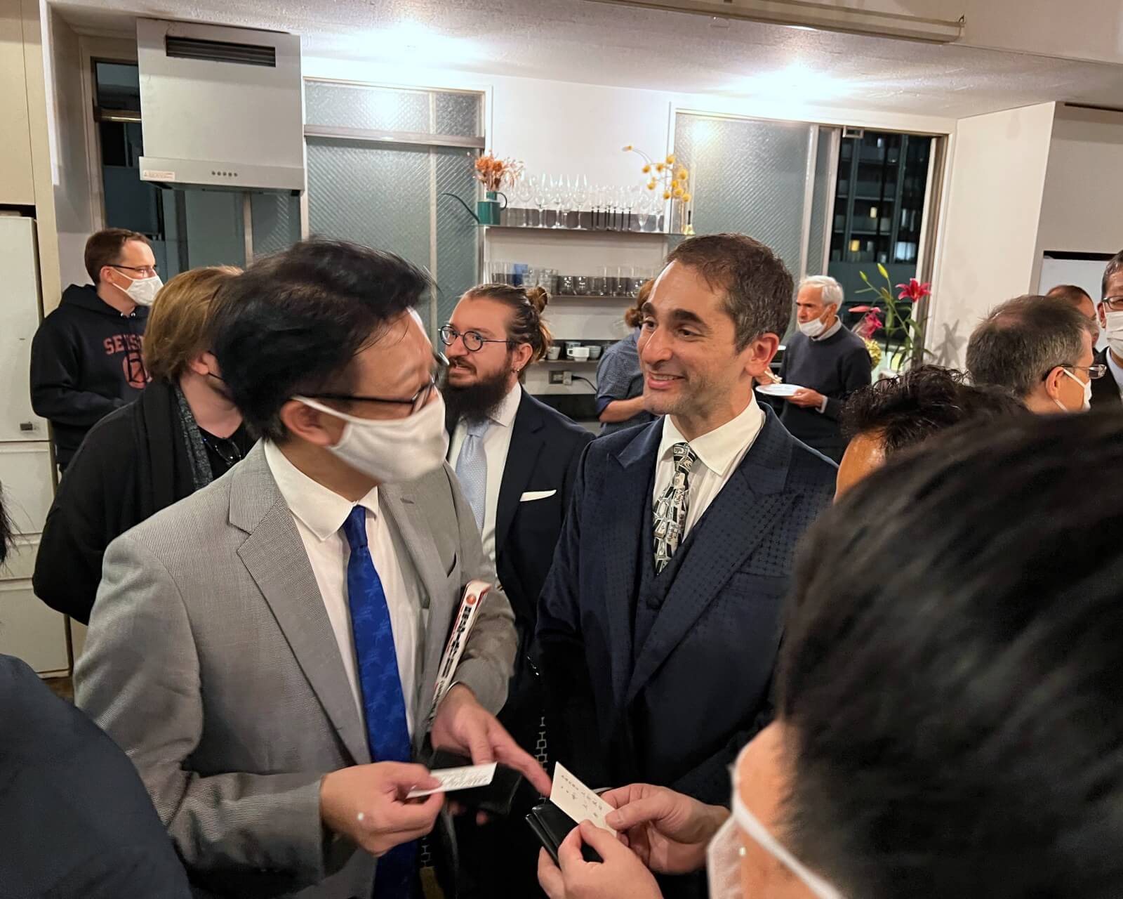 Benjamin Boas speaking with guests at his book release party in Nagatacho.