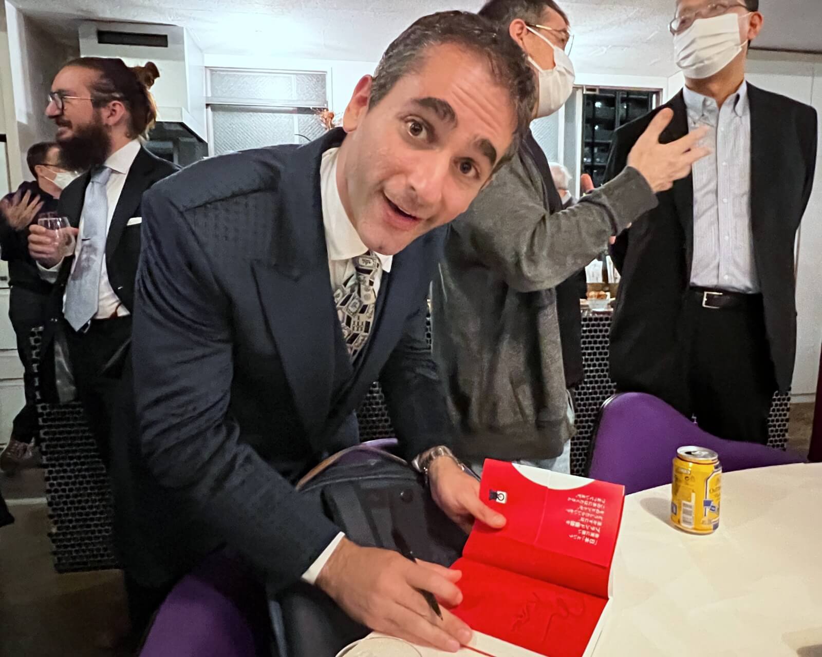 Benjamin Boas signing a copy of his new book